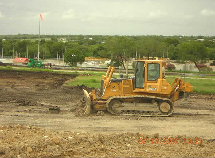 Bull Dozer Leveling Excavation Site